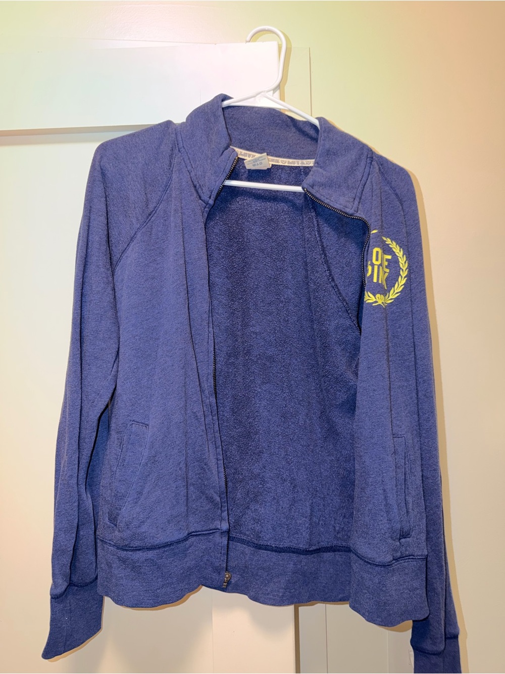 Victoria's Secret Navy Blue Zip-Up Sweater with Green Yellow Crest